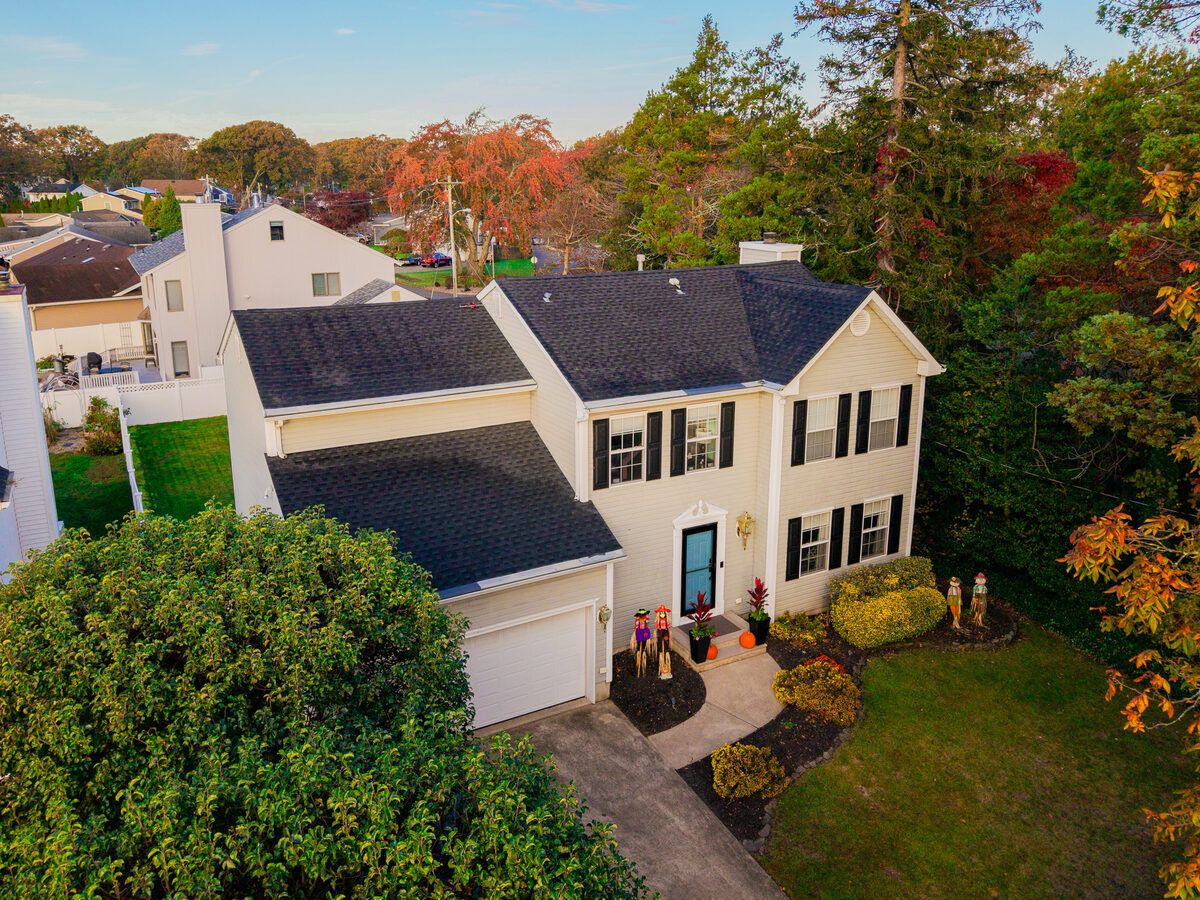 New charcoal asphalt shingle roof installed by Paragon Exteriors